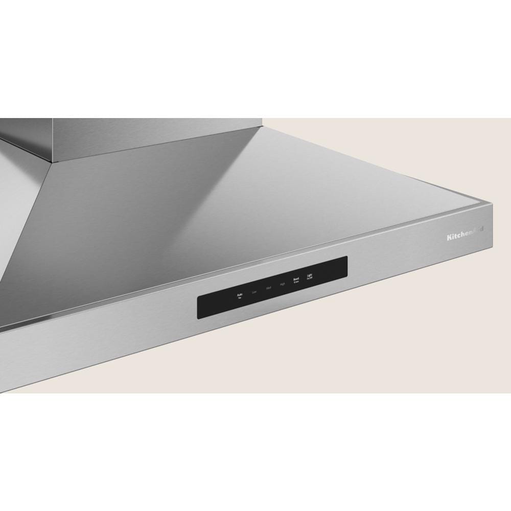 Stainless steel wall-mount canopy hood with digital touch controls in KitchenAid range hoods collection