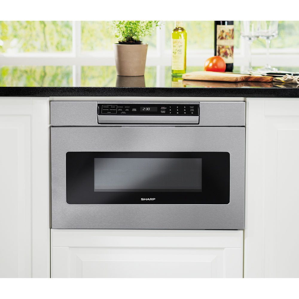 Built-in stainless steel microwave drawer with digital touch controls in modern kitchen setting for appliances and home improvement