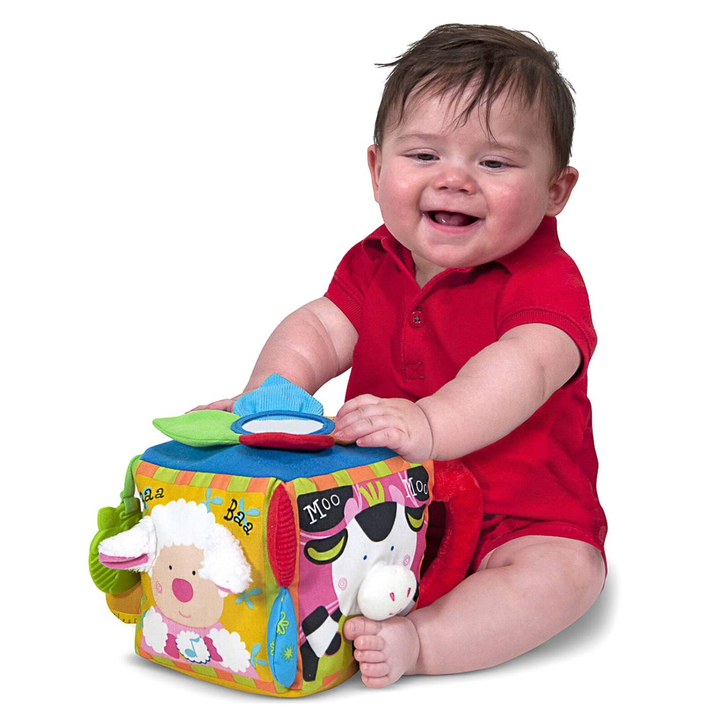 Baby in red outfit playing with colorful musical farmyard cube toy in Children's and Under $50 collections