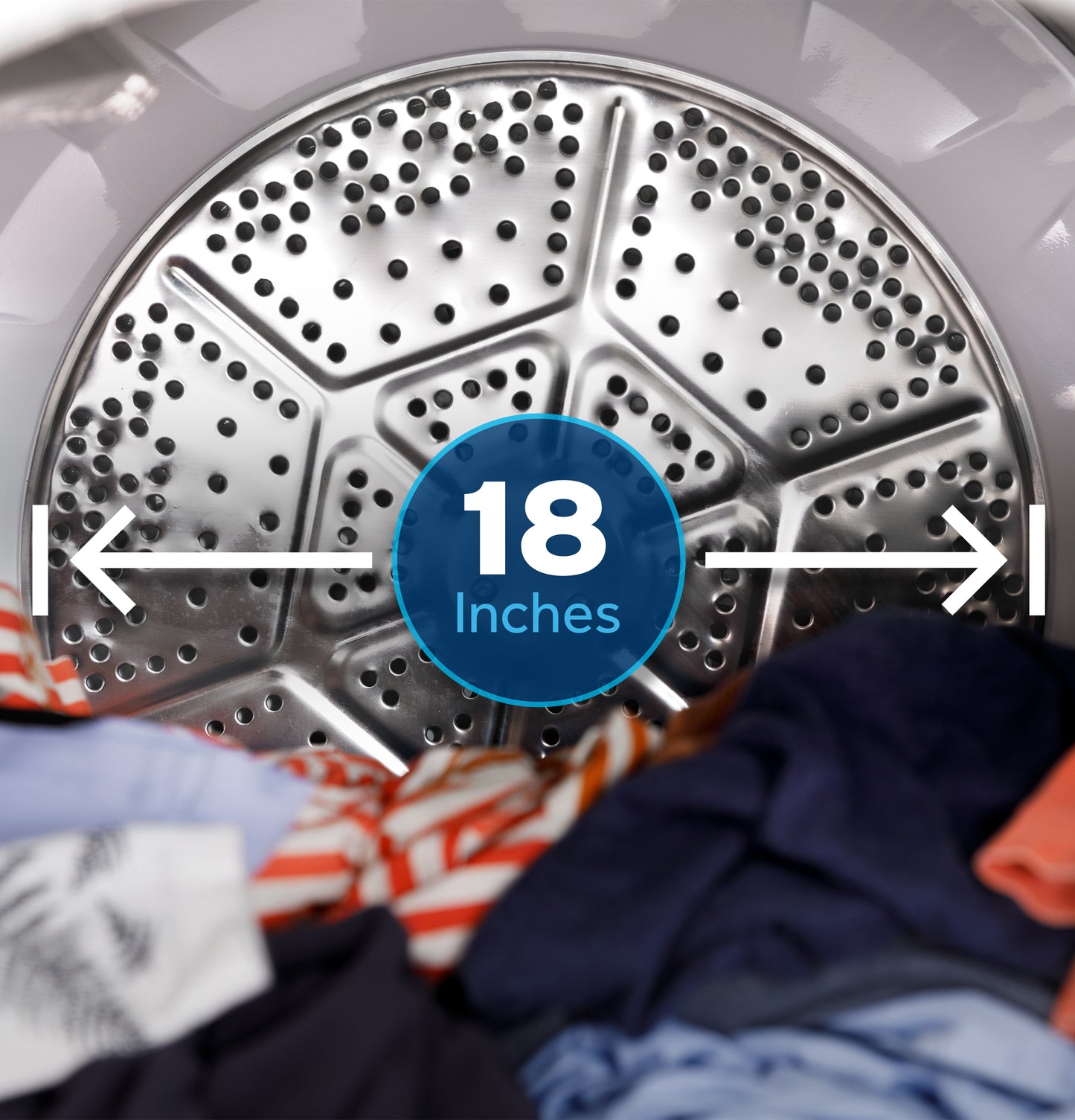 Inside view of metal dryer drum with 18-inch diameter and assorted clothes in home appliances collection