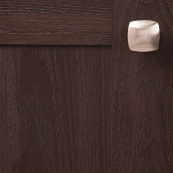 Square satin nickel knob with smooth Euro-contemporary design installed on dark wood cabinetry in hardware collections under $50