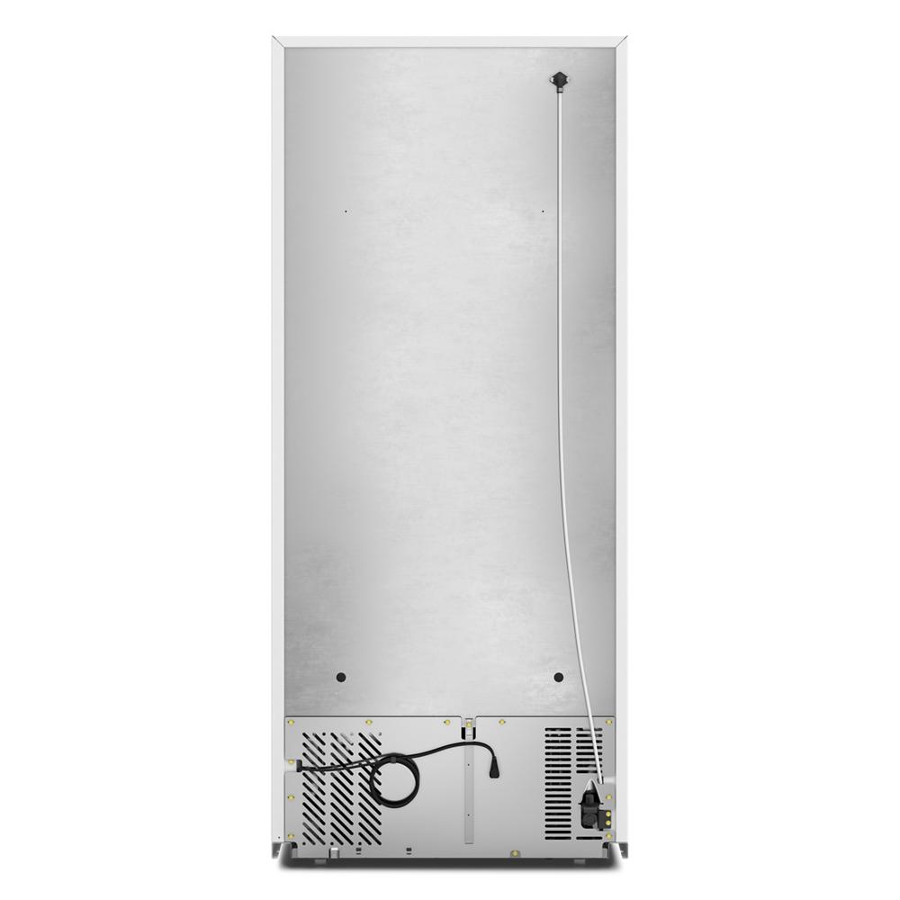 Rear view of a stainless steel top freezer refrigerator with power cord and ventilation for kitchen appliances collections