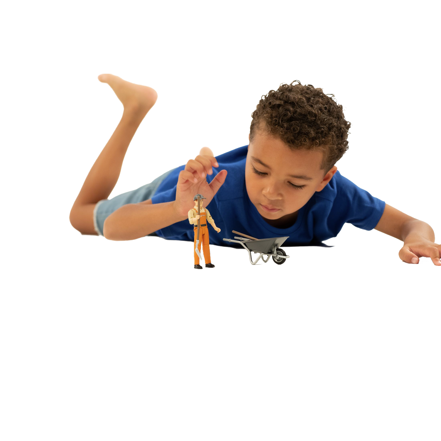 Young boy in blue shirt playing with Bruder municipal worker figure and gray wheelbarrow from toys and games under $50 collection