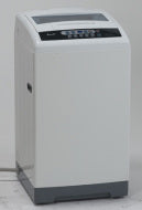 White top load washer with digital controls, compact design, and sturdy base in Washers & Dryers collection