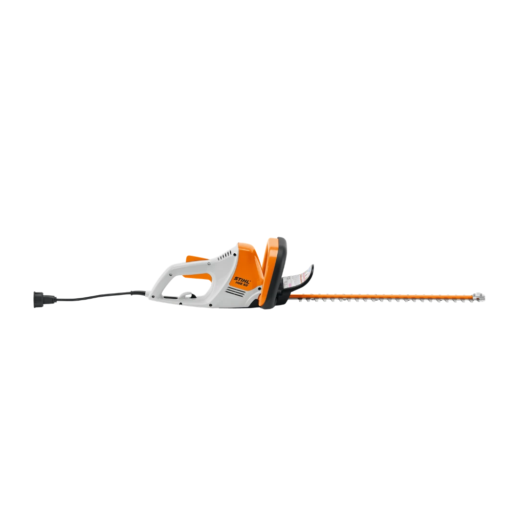 Electric hedge trimmer with orange and white design for precise trimming in tools and home improvement tasks