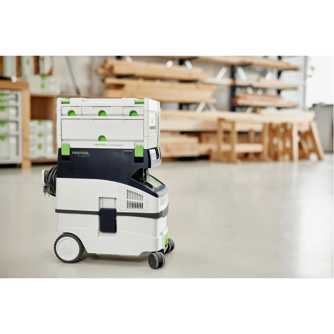 White and green Festool mobile tool storage system for workshop organization and woodworking tools collections
