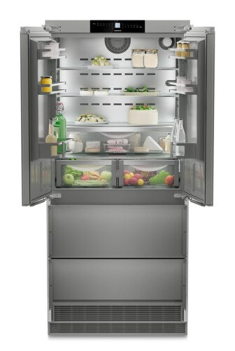 Built-in stainless steel French door refrigerator with bottom freezer and adjustable shelves in kitchen appliances collection