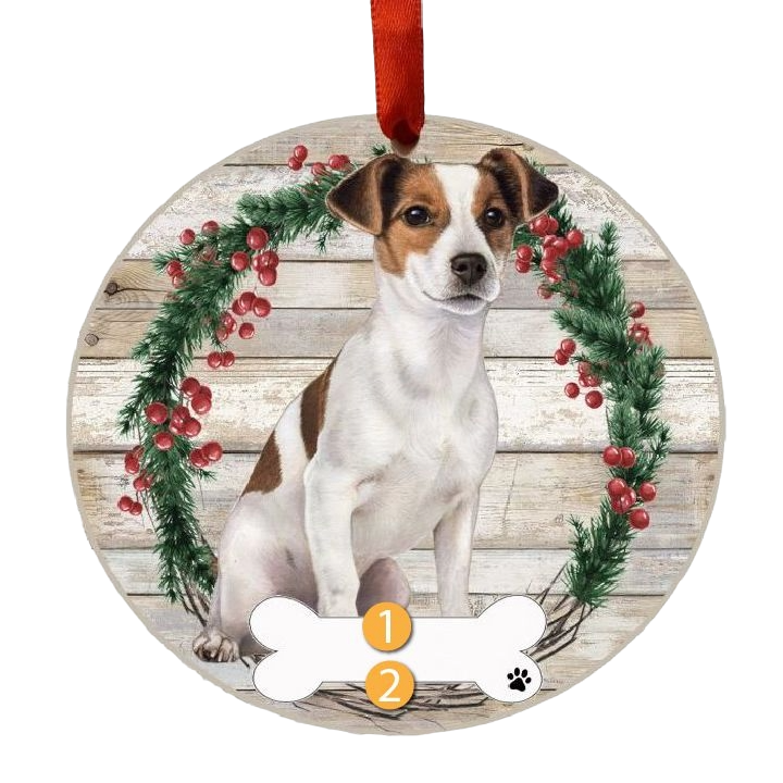 Round Christmas ornament featuring a Jack Russell dog inside a festive berry and pine wreath design