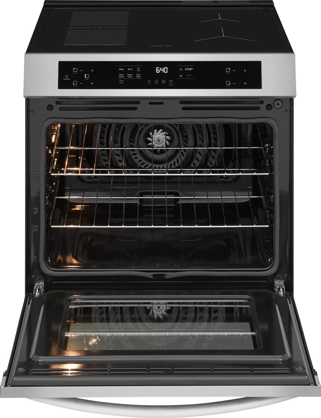 Front control induction range with air fry oven open showing interior racks and illuminated cooking cavity in appliances collection