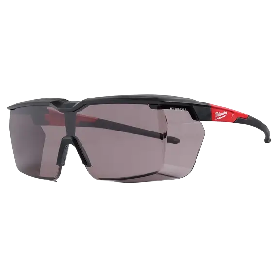 Tinted dual coat safety glasses with wraparound frame designed to fit over prescription eyewear in protective gear collections