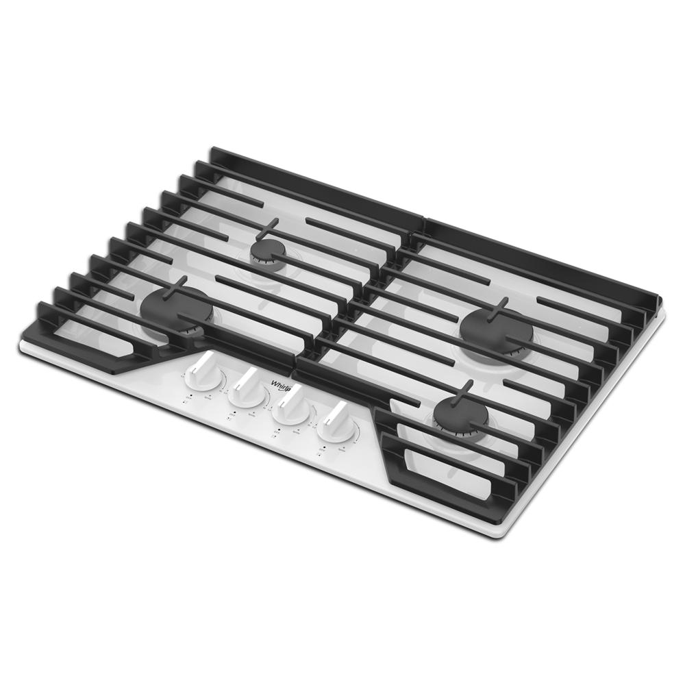 Angled view of stainless steel gas cooktop with four burners, black hinged cast-iron grates, and white control knobs