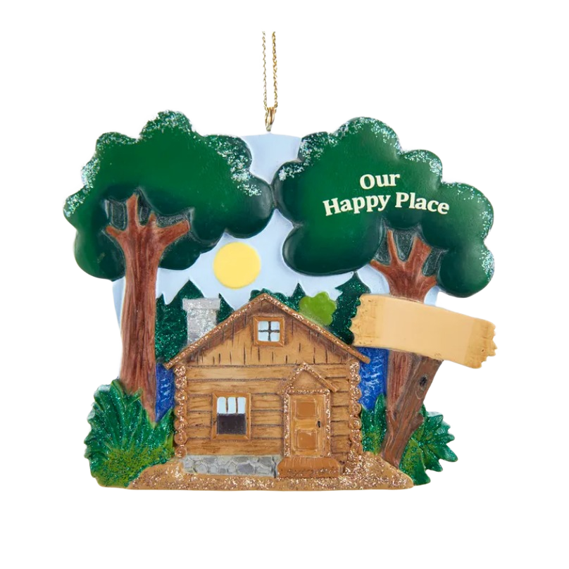 Hand-painted lake cabin ornament with green trees, sun, and a customizable wooden sign for personalized messages
