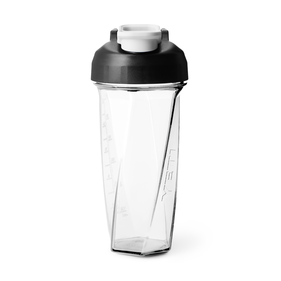 Clear 27 oz. shaker bottle with black lid and white flip cap, designed for durability and hydration, from Drinkware & Kitchen collections at Hartville Hardware.