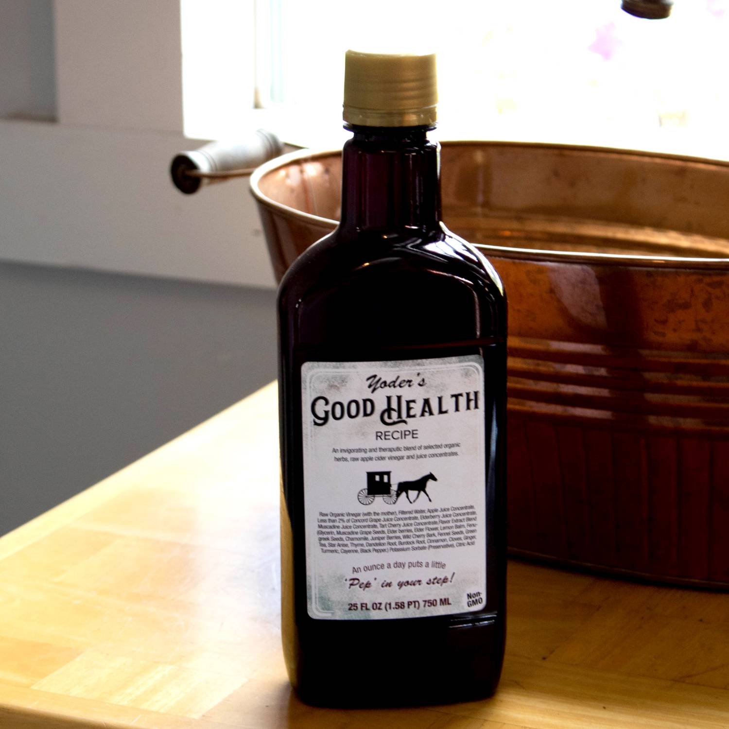 Dark amber bottle with gold cap and vintage-style label featuring herbal health recipe and horse-drawn buggy illustration