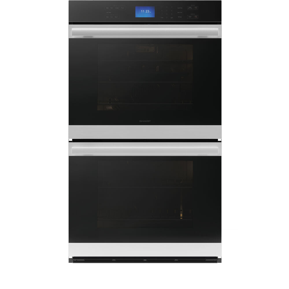 Built-in modern electric double wall oven with digital display and stainless steel handles in kitchen appliances collection