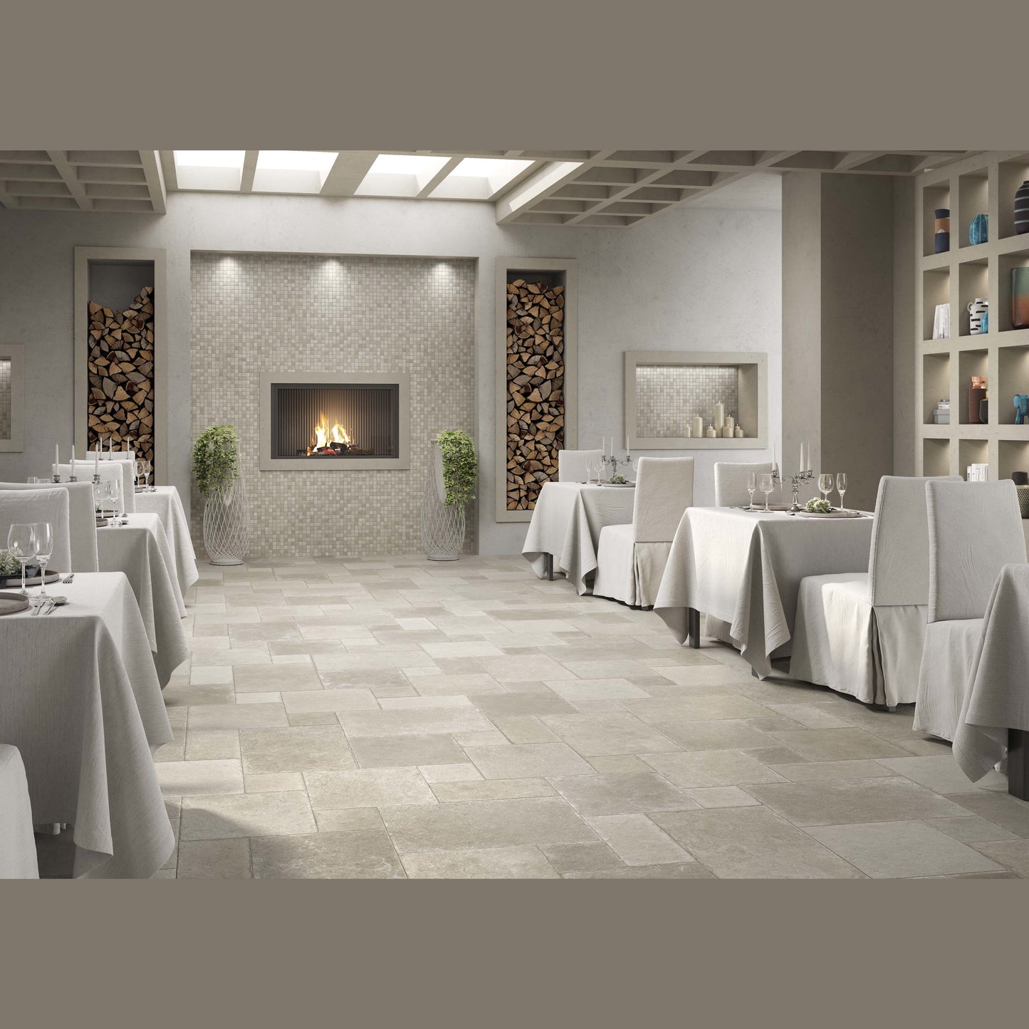 Indoor dining room with matte neutral stone tile flooring and a modern fireplace for home improvement flooring projects