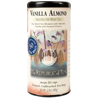 Tall cylindrical tin of vanilla almond black tea with natural unbleached tea bags and artistic label design