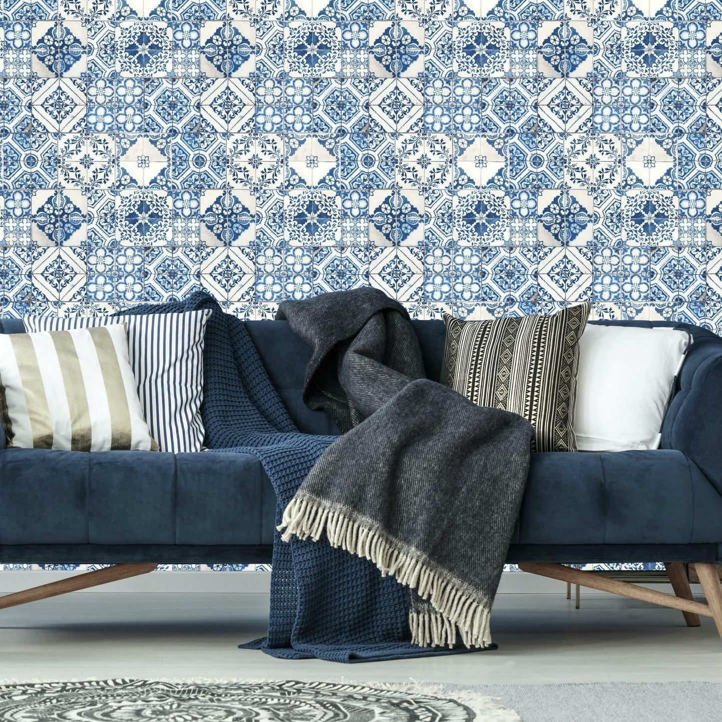 Blue and white Mediterranean tile patterned vinyl peel and stick wallpaper in stylish home decor setting