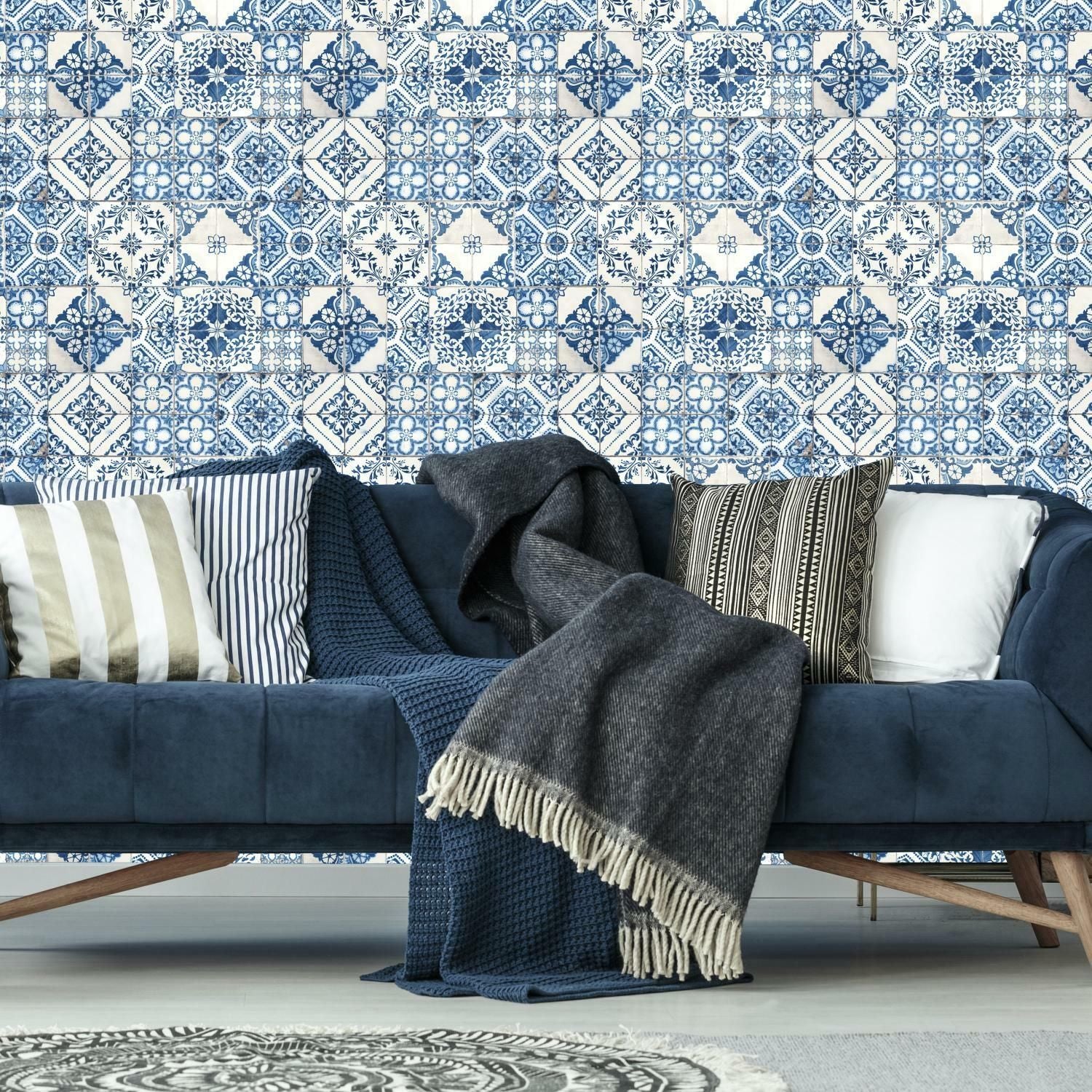 Blue and white Mediterranean tile patterned vinyl peel and stick wallpaper in stylish home decor setting