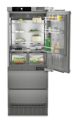 Open built-in refrigerator with bottom freezer, adjustable shelves, clear crispers, and door storage in Appliances collection