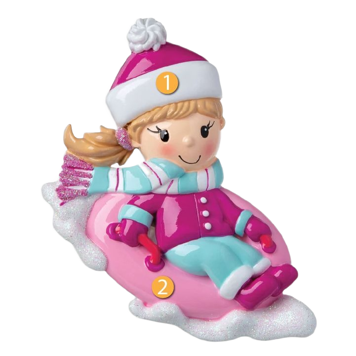 Girl wearing pink winter outfit and scarf riding pink snow tube Christmas tree decoration under $50 collection