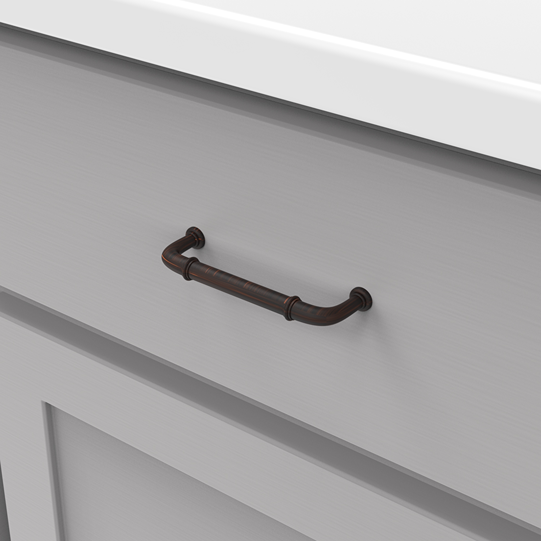 Rustic bronze cabinet pull with a curved cottage style design for home improvement and hardware projects