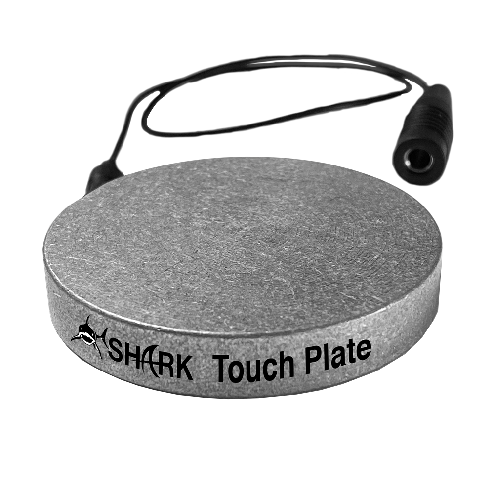 Circular metal touch plate with attached cable for precise measurements in woodworking and CNC tool applications