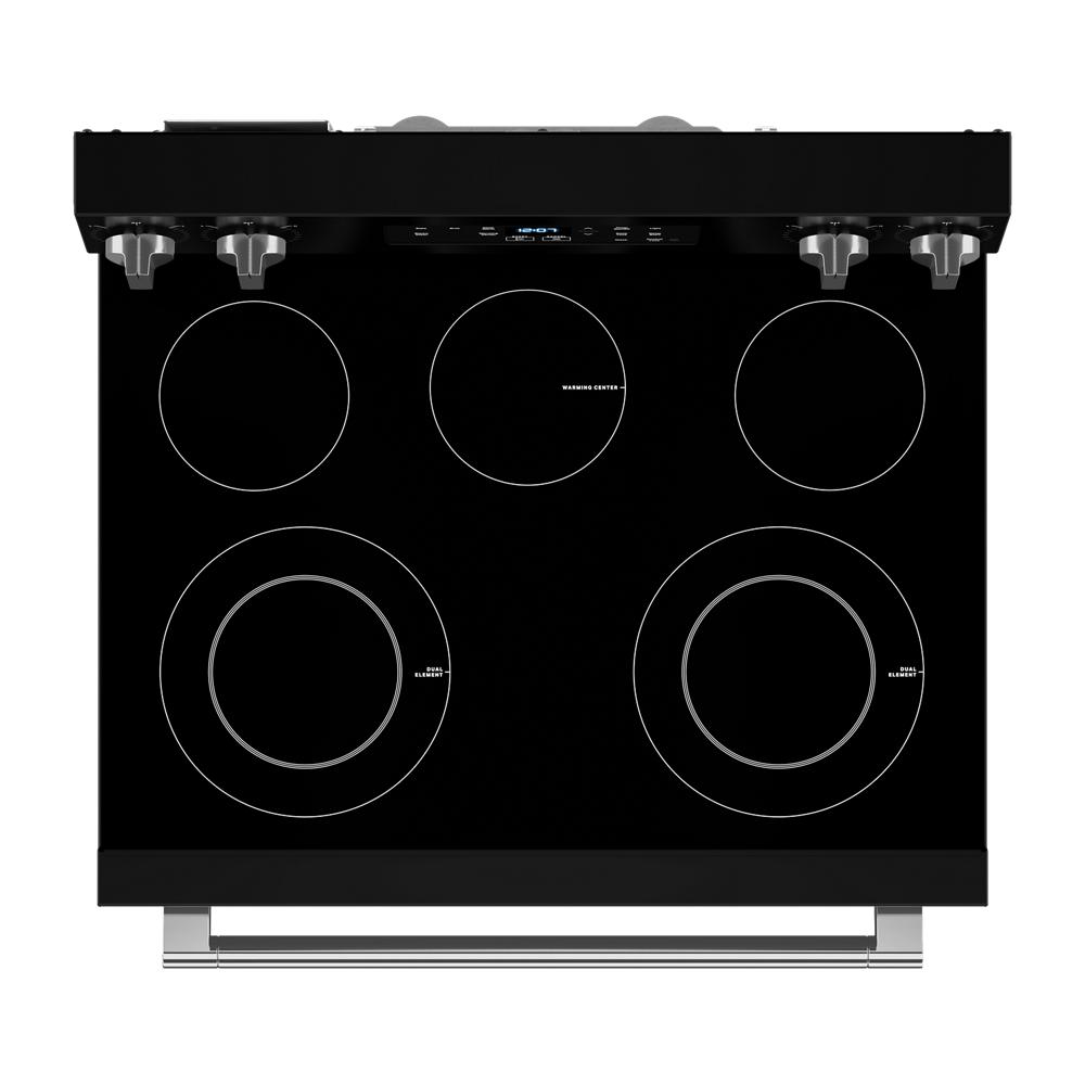 Top view of black electric range with five radiant cooking elements and stainless steel control knobs from kitchen appliances collection