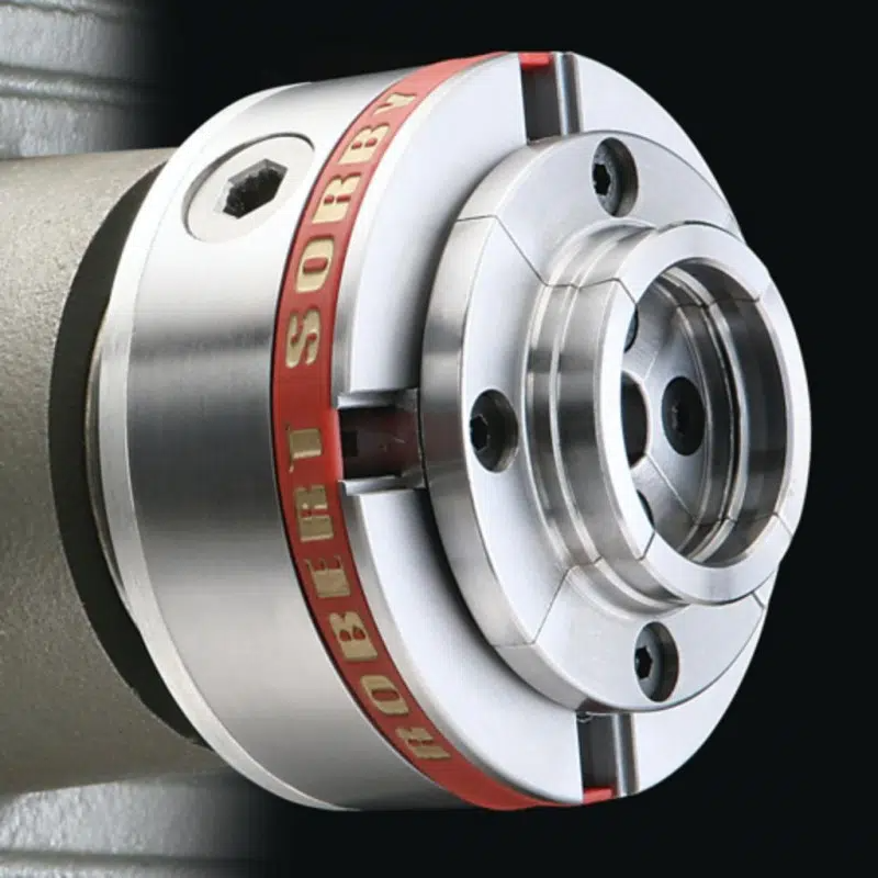 Precision metal turning chuck with engraved red band for tool holding in woodworking and home improvement tasks