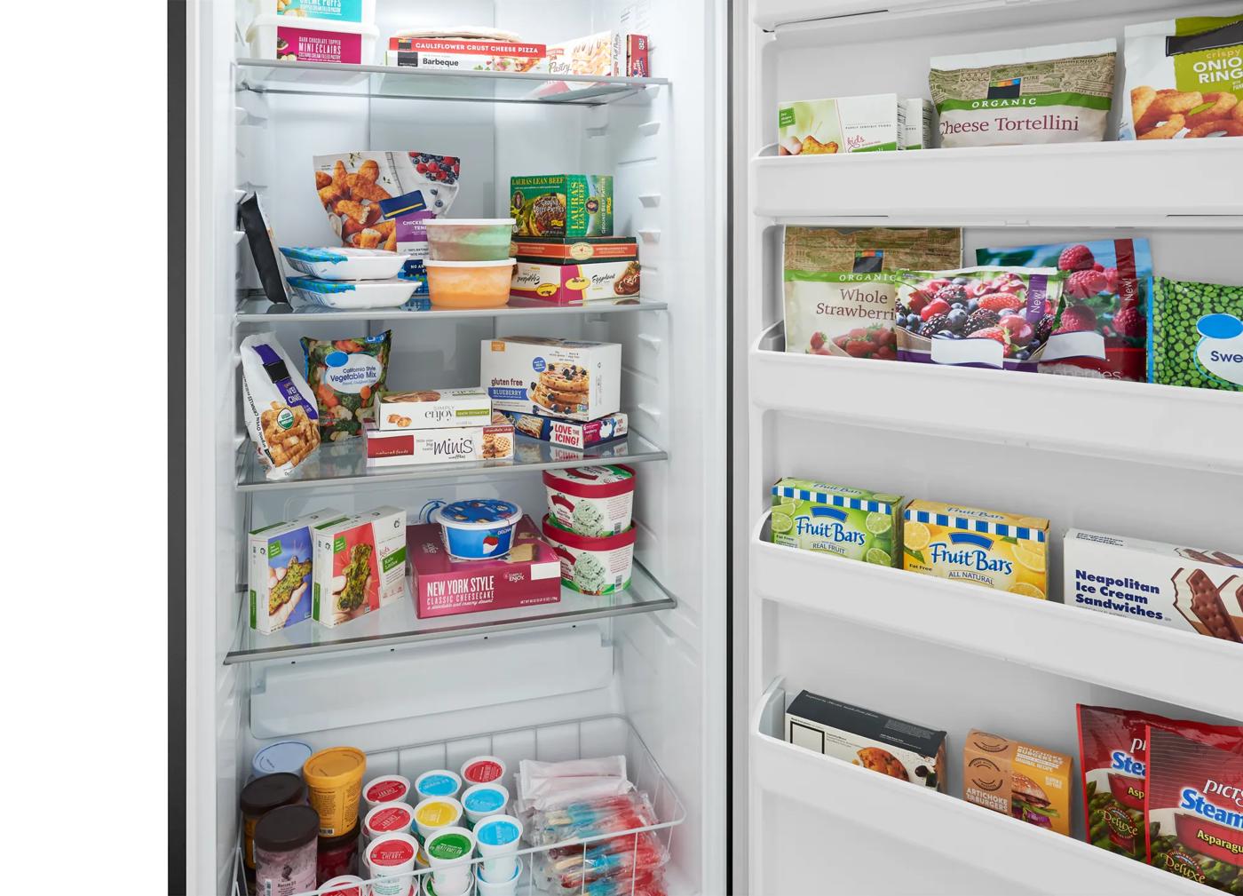 Open 20 Cu. Ft. upright freezer in dark steel finish showing organized frozen food storage from Freezers & Ice Makers collection