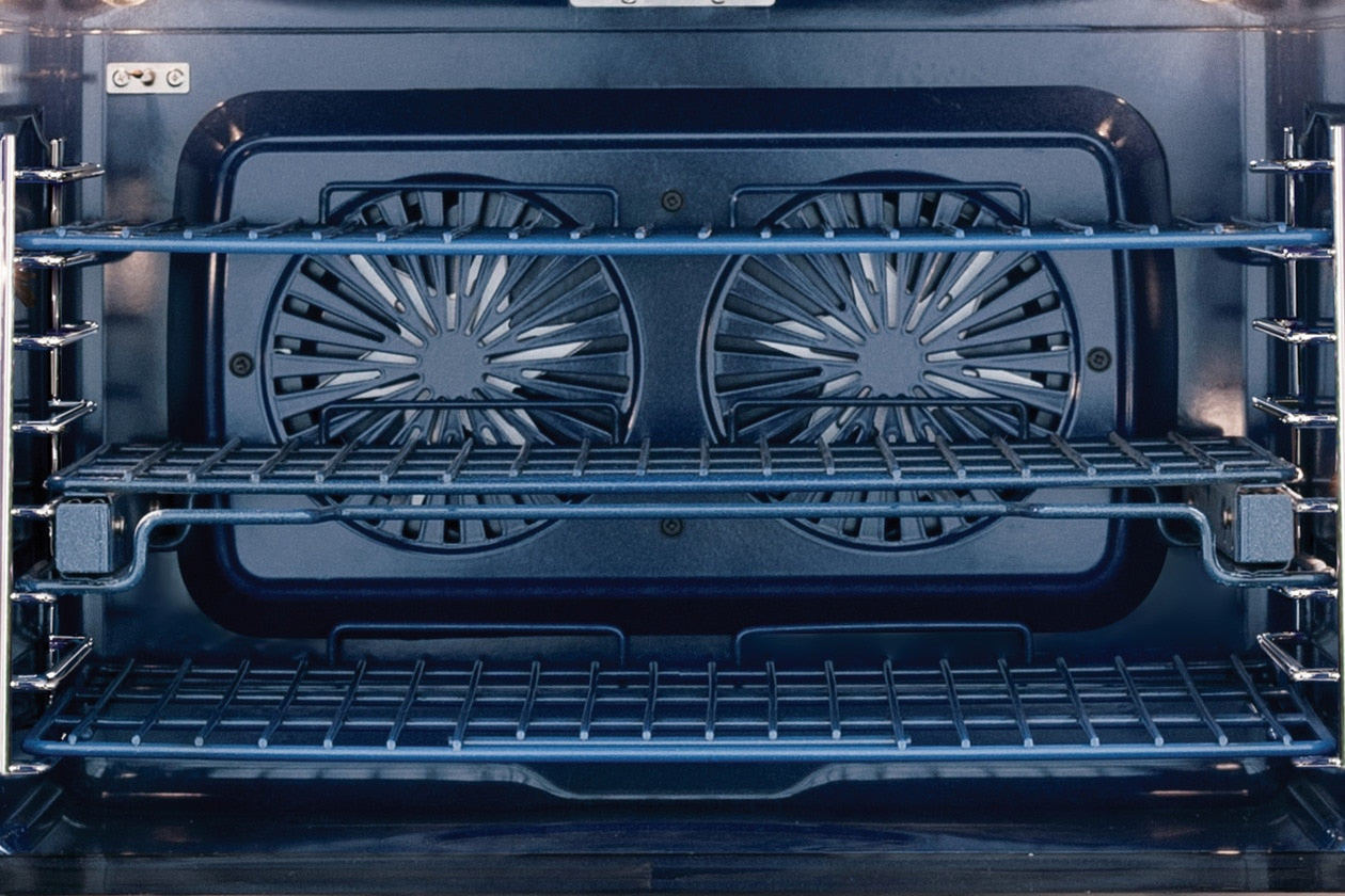 Interior view of electric double wall oven with convection fans and Luxury-Glide® oven racks from kitchen appliances collection