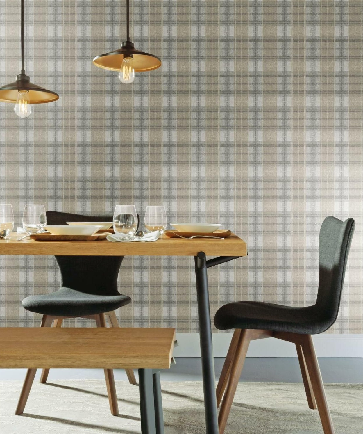 Dining area featuring gray tweed plaid peel and stick wallpaper with wooden table and modern gray chairs