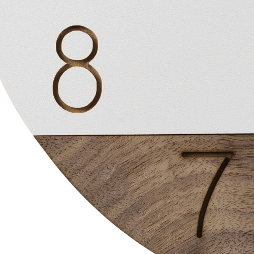 Close-up of 8 and 7 laser-engraved numbers on white dial and wood accent of a Sierra Wood wall clock.