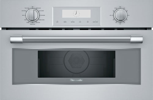 Stainless steel speed oven front with control knobs, digital timer, and interior convection fan in Microwaves collection