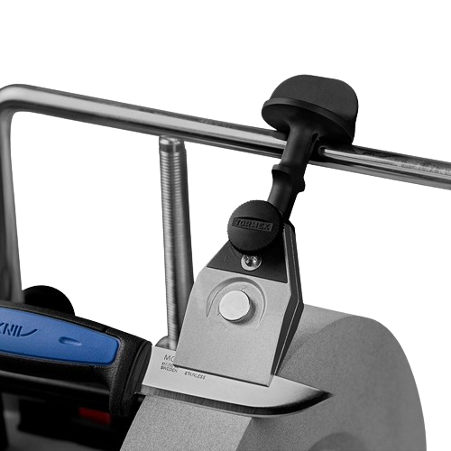 Precision knife sharpening jig with metal body and black adjustment knob mounted on grinding wheel shaft