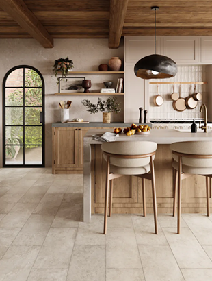 Light beige luxury vinyl tile flooring with subtle variation in a modern kitchen featuring wood cabinetry and neutral décor