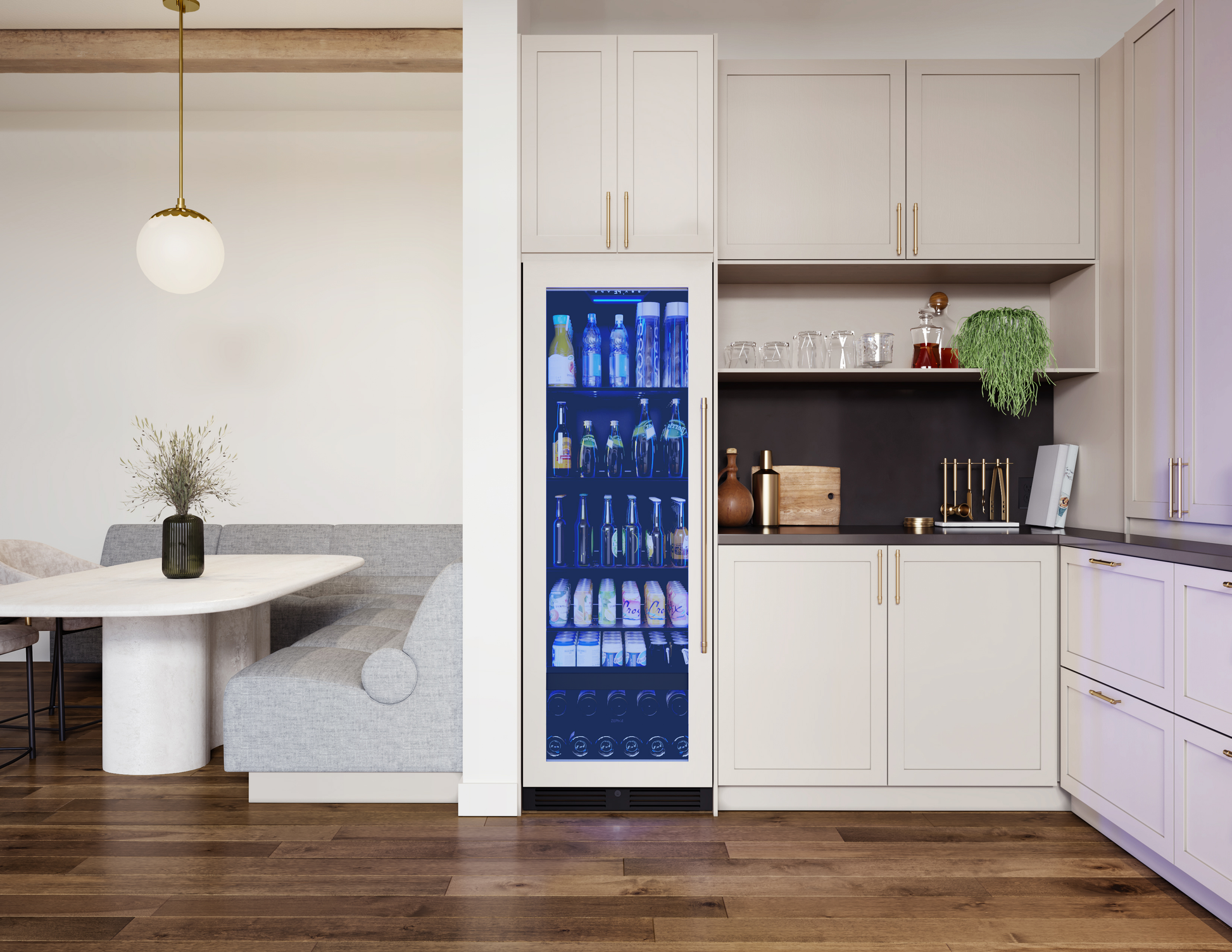 Panel-ready full-size beverage cooler with glass door and blue interior lighting in kitchen cabinetry at Hartville Hardware
