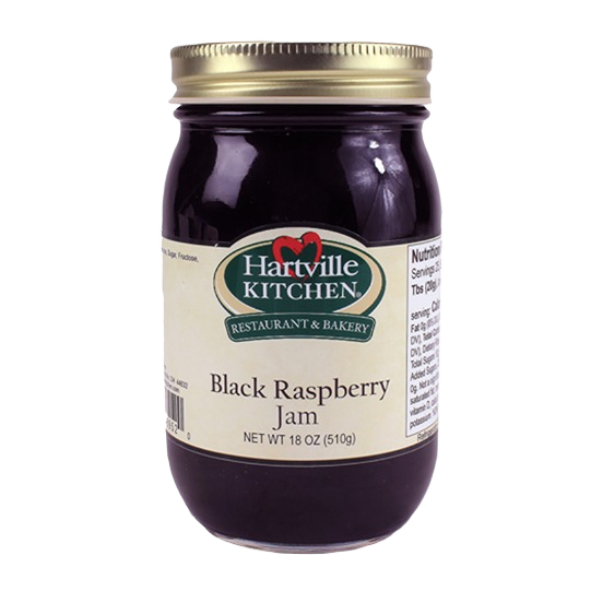 Glass jar of black raspberry jam with gold lid and Hartville Kitchen label from the Jams & Jellies collection