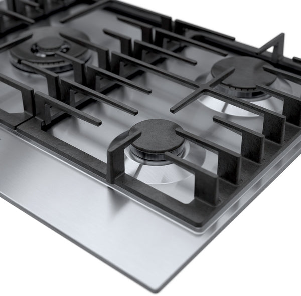 Close-up of stainless steel gas cooktop with four burners and cast iron grates from Bosch appliances collection