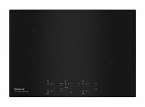 Black 30-inch induction cooktop with five cooking elements and sensor controls from KitchenAid Appliances collection