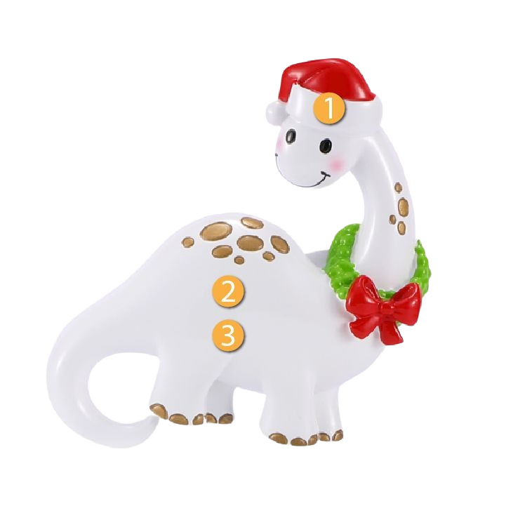 White dinosaur ornament with gold spots, red Santa hat, and green wreath for festive Christmas tree decor under $50