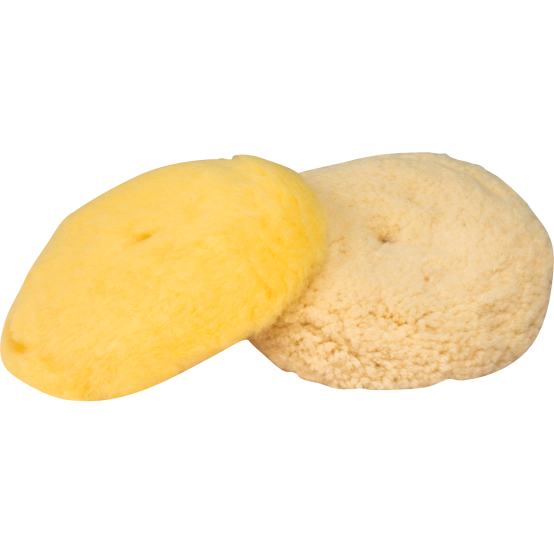 Two round polishing pads in yellow and beige soft wool for use with variable speed polishers in home improvement tasks