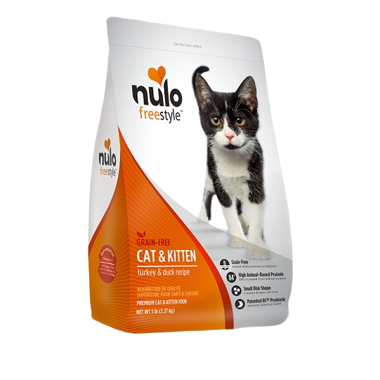 White and orange bag of grain-free cat and kitten dry food featuring turkey and duck recipe with black and white cat image