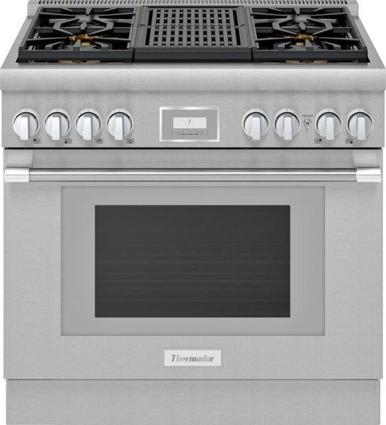 Stainless steel professional dual fuel range with control knobs and central digital display from kitchens collection