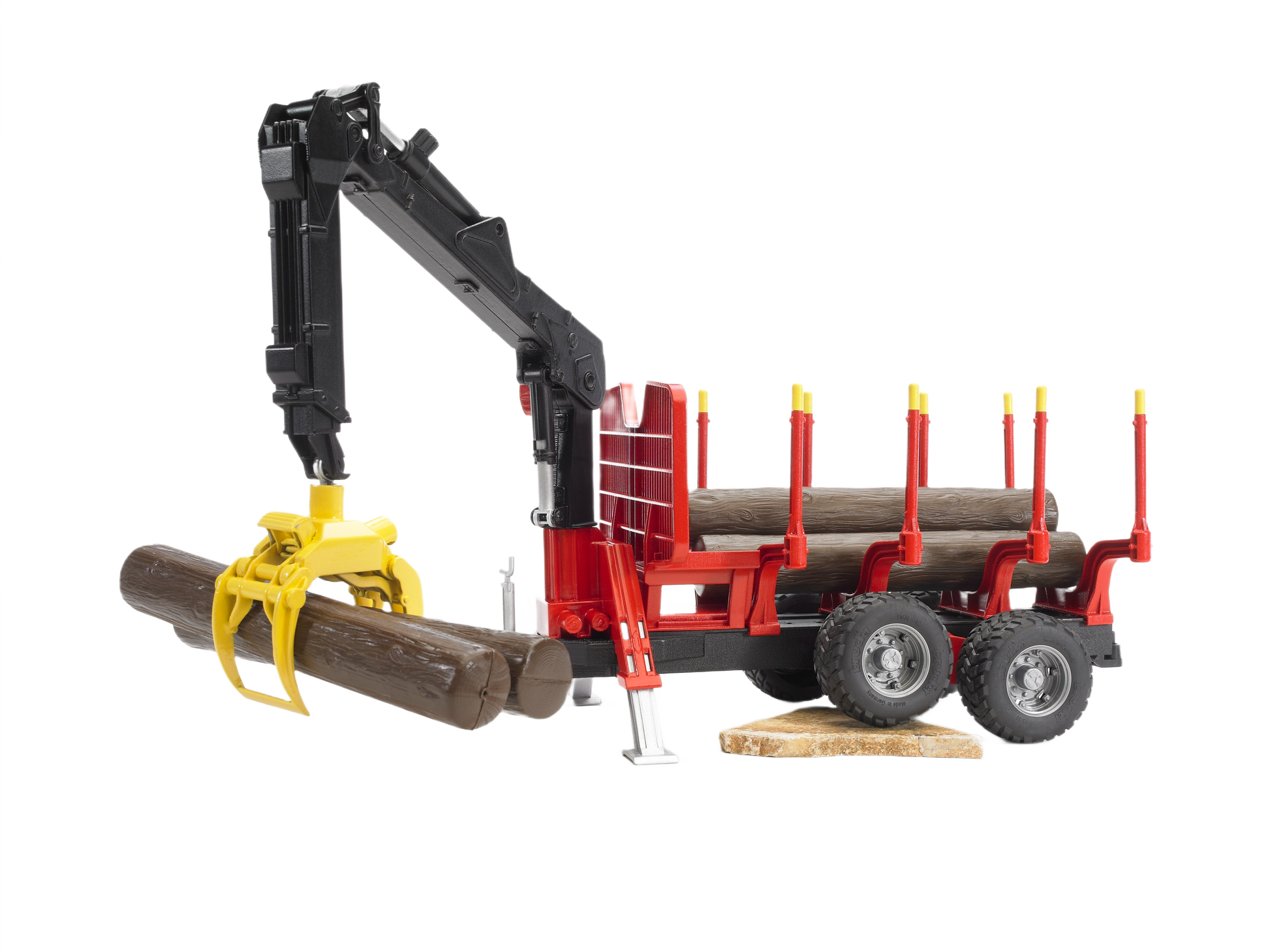 Red and black forestry trailer toy with yellow grapple lifting logs, part of Bruder Toys in Vehicles & Remote Controlled Toys collection
