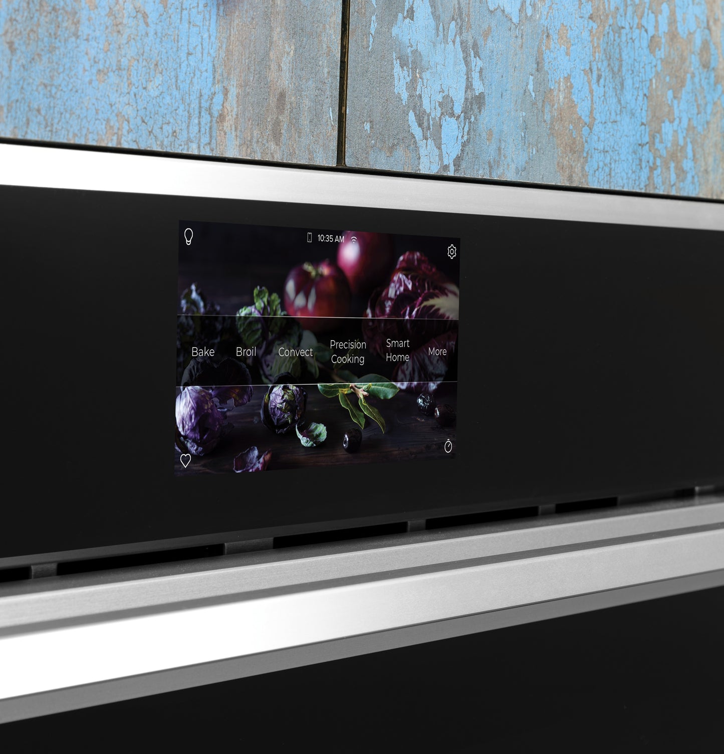 Close-up of digital control panel displaying cooking options on black minimalist single wall oven in kitchen appliances collection