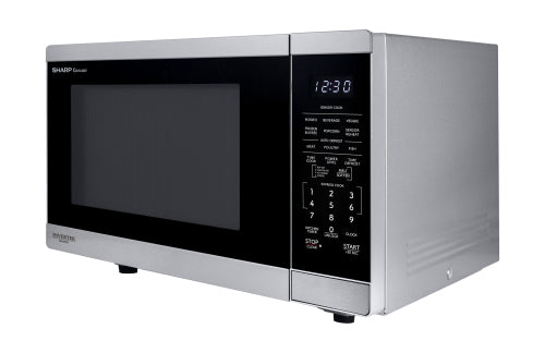 Compact stainless steel countertop microwave with digital keypad and popcorn preset from kitchen appliances collection