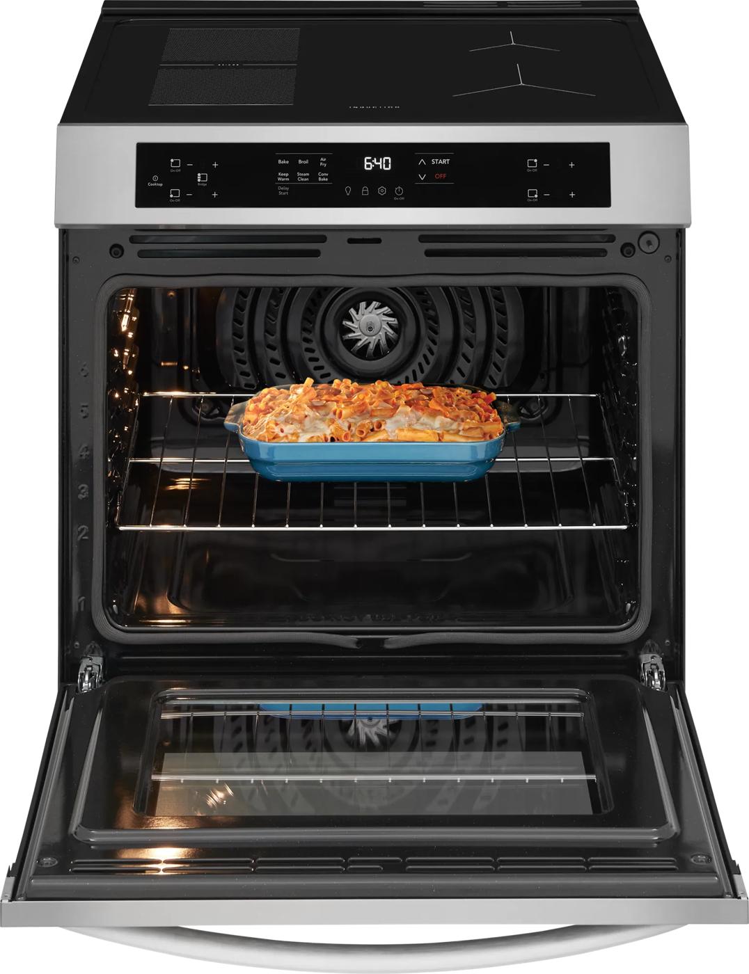 Stainless steel induction range with front controls and air fry oven cooking casserole in kitchen appliances collections