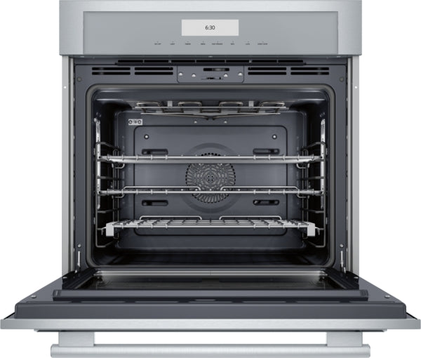 Open stainless steel single wall oven showing three full-access telescopic racks and digital control panel from Thermador collection