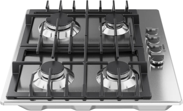 Stainless steel gas cooktop with four high-efficiency burners and heavy-duty cast iron grates in kitchen appliances collection